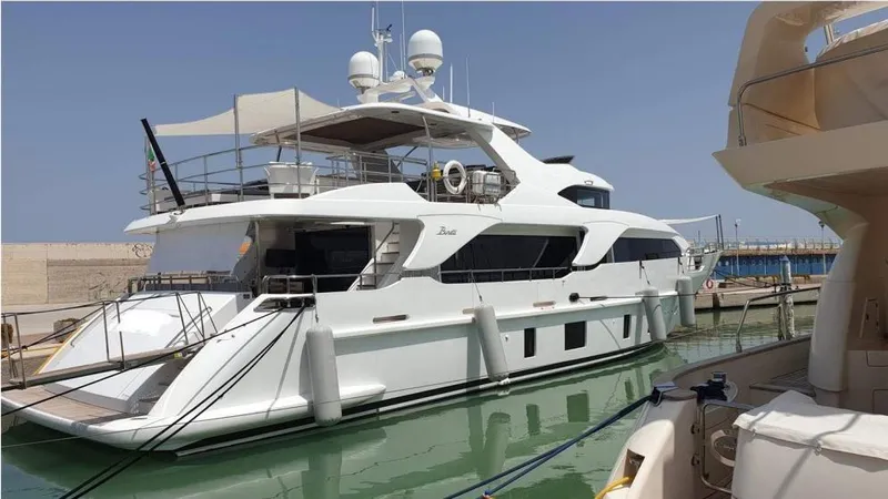  Yacht Photos Pics Luxury 2013 Benetti Delfino 93 yacht docked in marina.