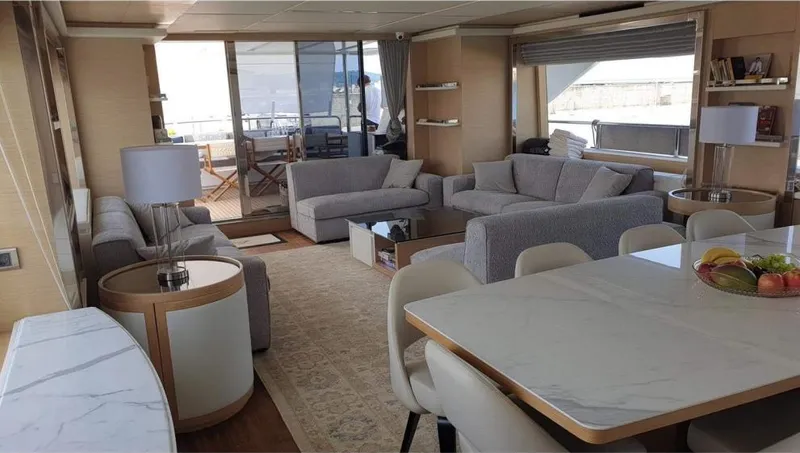  Yacht Photos Pics Luxurious interior of a 2013 Benetti Delfino 93 yacht with modern furnishings.