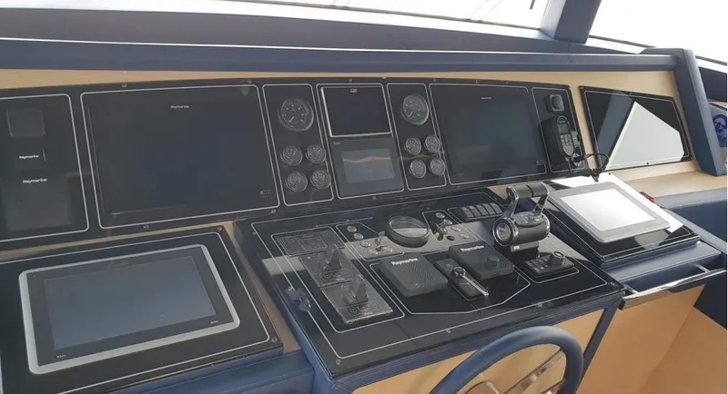  Yacht Photos Pics Control panel of a 2013 Benetti Delfino 93 yacht with advanced navigation systems.