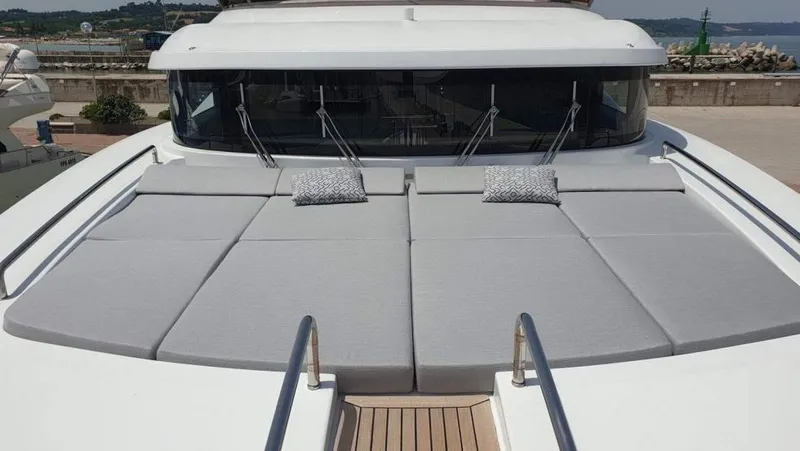  Yacht Photos Pics 2013 Benetti Delfino 93 yacht with spacious sunbathing area and cushions.