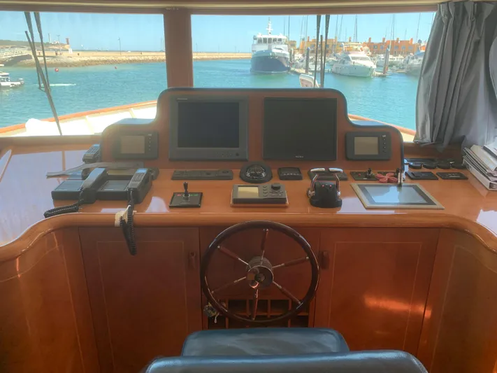  Yacht Photos Pics Pilot cabin of 2006 ABD 60 yacht with navigation equipment and sea view.