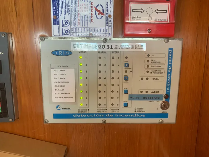  Yacht Photos Pics Fire detection control panel with indicator lights on a wooden surface, model ABD 60, 2006.
