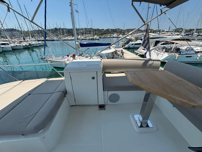  Yacht Photos Pics Flybridge of 2020 Jeanneau Prestige 420, featuring seating and table, docked in marina.