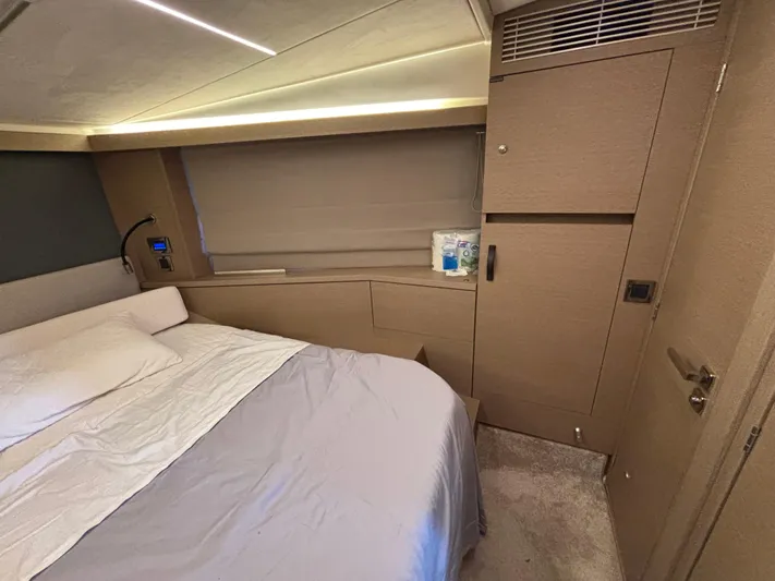  Yacht Photos Pics Cozy bedroom interior of 2020 Jeanneau Prestige 420 Flybridge yacht.
