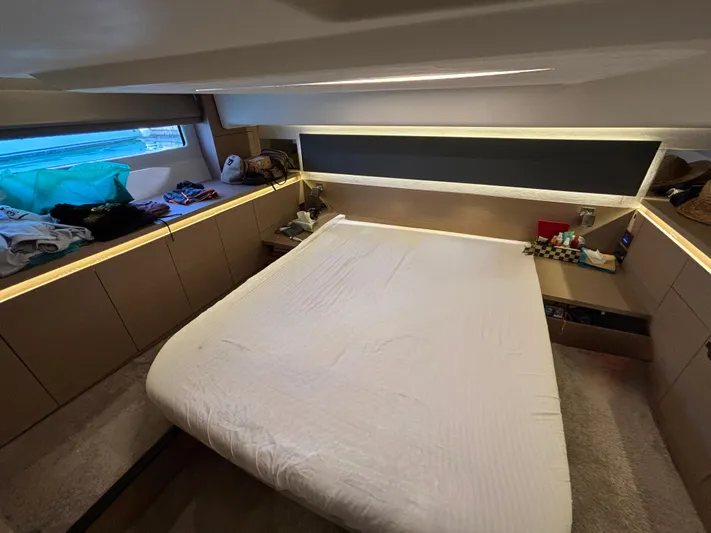  Yacht Photos Pics Luxurious bedroom interior of 2020 Jeanneau Prestige 420 Flybridge yacht with modern design.