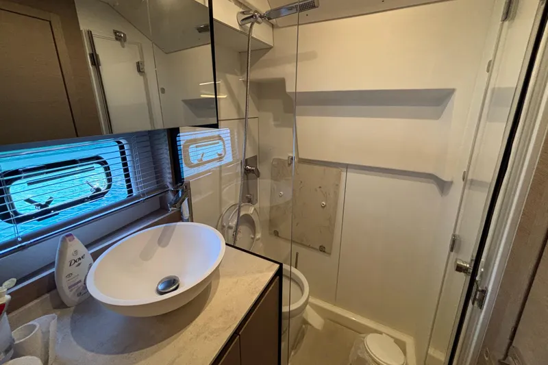  Yacht Photos Pics Luxurious bathroom in 2020 Jeanneau Prestige 420 Flybridge yacht with modern fixtures.