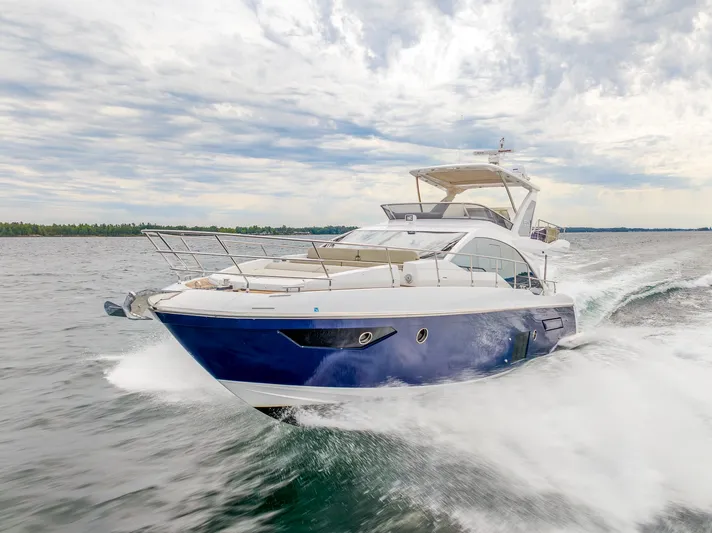  Yacht Photos Pics 2018 Azimut 50 Flybridge yacht cruising on open water.