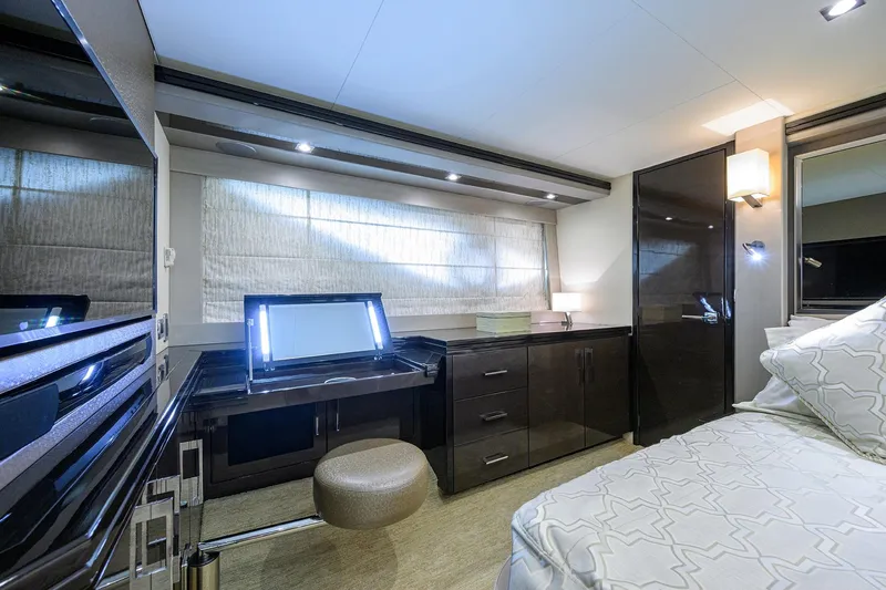 Andiamo Yacht Photos Pics Luxurious interior of 2016 Marquis 660 Sport Yacht with modern furnishings and elegant design.