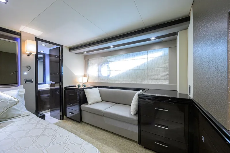 Andiamo Yacht Photos Pics Luxurious interior of 2016 Marquis 660 Sport Yacht with elegant furnishings and modern design.