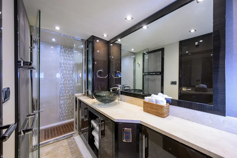 Andiamo Yacht Photos Pics Luxurious bathroom in 2016 Marquis 660 Sport Yacht with modern fixtures and elegant design.