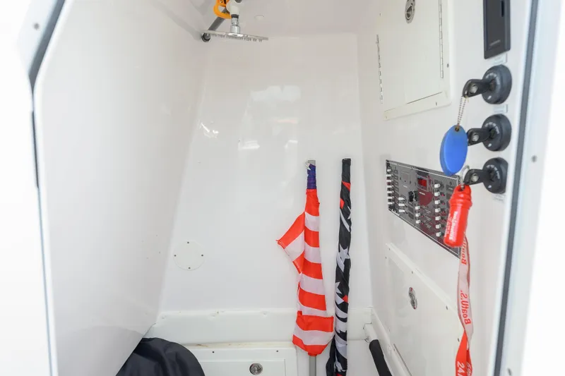 Seahunter 33 Yacht Photos Pics Interior of 2018 SeaHunter 33 Tournament boat with flags and control panel.