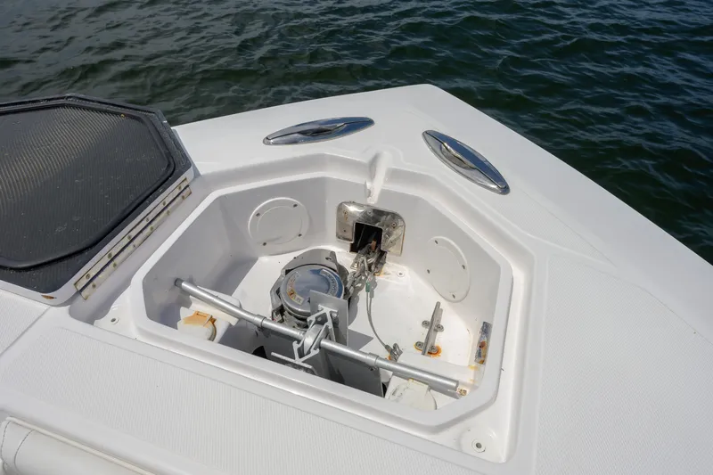 Seahunter 33 Yacht Photos Pics 2018 SeaHunter 33 Tournament boat anchor compartment, open on calm water.