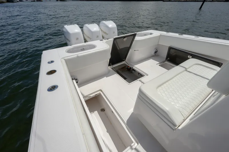Seahunter 33 Yacht Photos Pics 2018 SeaHunter 33 Tournament boat interior with seating and storage compartments.