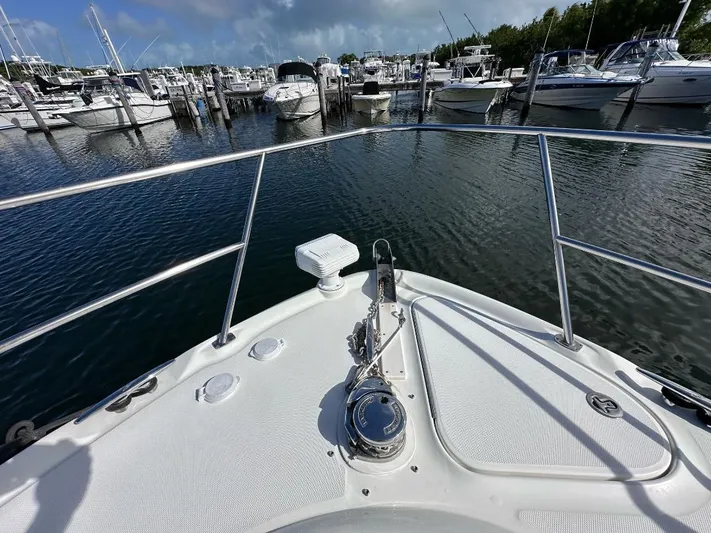 Off Duty Yacht Photos Pics Bow view of 2004 Sea Ray 360 Sundancer docked at marina.