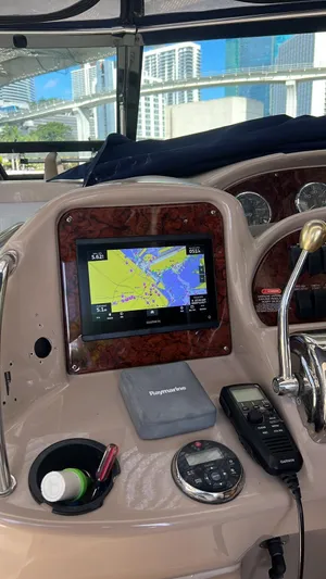 Off Duty Yacht Photos Pics Control panel of a 2004 Sea Ray 360 Sundancer with navigation equipment.