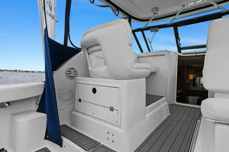 Indeed Yacht Photos Pics 2005 Tiara Yachts 2900 Open interior with white seating and ocean view.