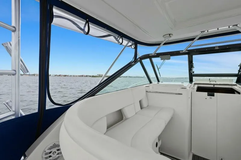 Indeed Yacht Photos Pics Interior of 2005 Tiara Yachts 2900 Open, featuring white seating and ocean view.