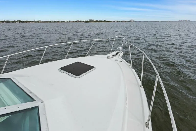 Indeed Yacht Photos Pics 2005 Tiara Yachts 2900 Open cruising on calm waters.