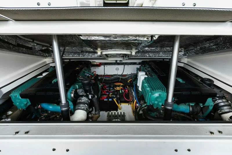 Indeed Yacht Photos Pics Engine compartment of 2005 Tiara Yachts 2900 Open, showcasing dual engines and components.