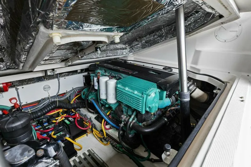 Indeed Yacht Photos Pics Engine compartment of 2005 Tiara Yachts 2900 Open, showcasing detailed mechanical components.