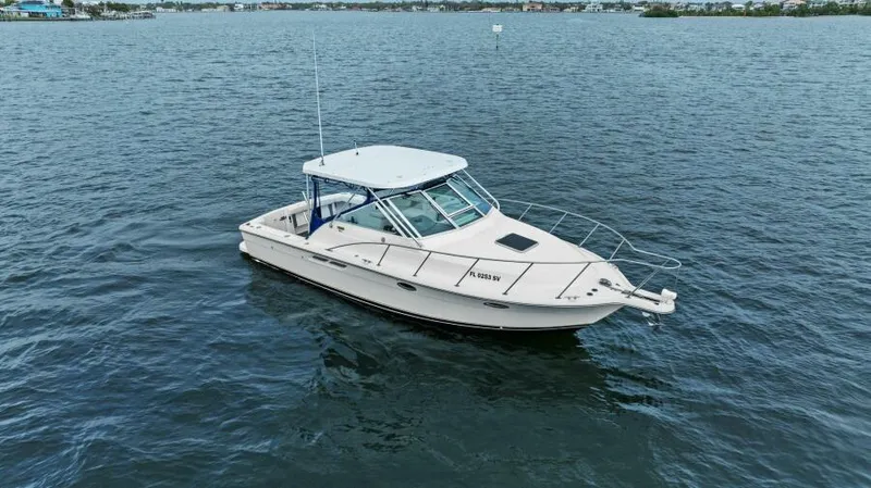 Indeed Yacht Photos Pics 2005 Tiara Yachts 2900 Open boat on calm water.