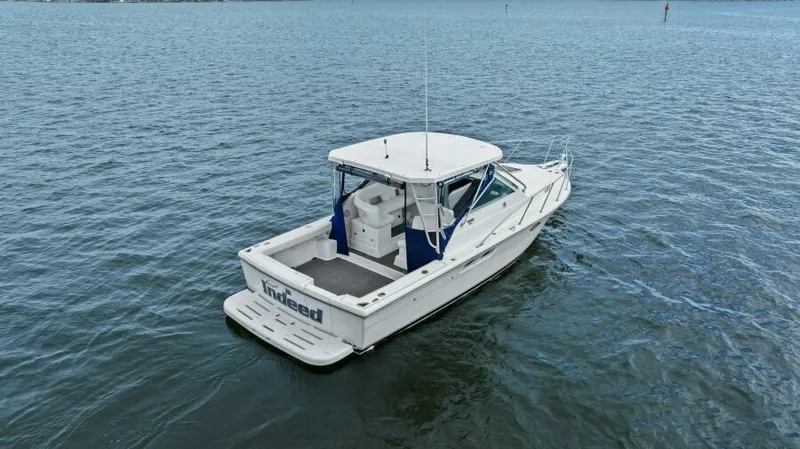 Indeed Yacht Photos Pics 2005 Tiara Yachts 2900 Open boat on calm water.