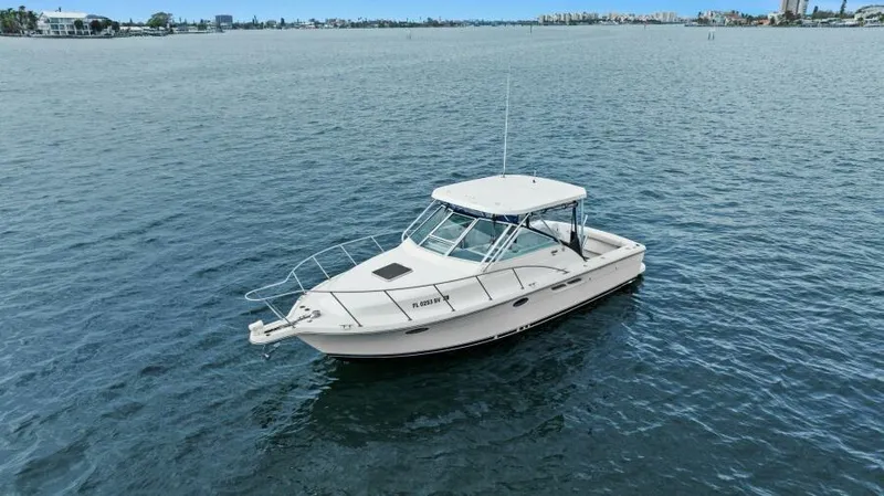 Indeed Yacht Photos Pics 2005 Tiara Yachts 2900 Open boat on calm water.