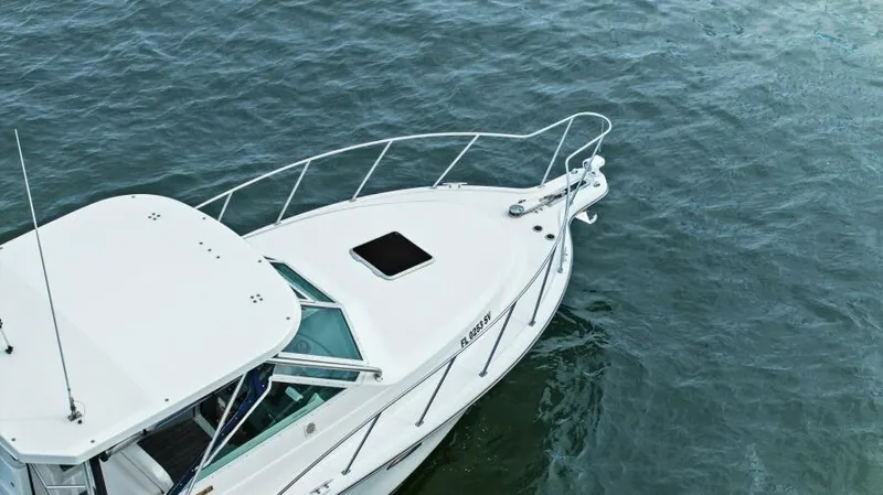 Indeed Yacht Photos Pics 2005 Tiara Yachts 2900 Open on calm water, top view.