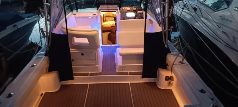 Indeed Yacht Photos Pics 2005 Tiara Yachts 2900 Open boat interior with ambient lighting and seating.