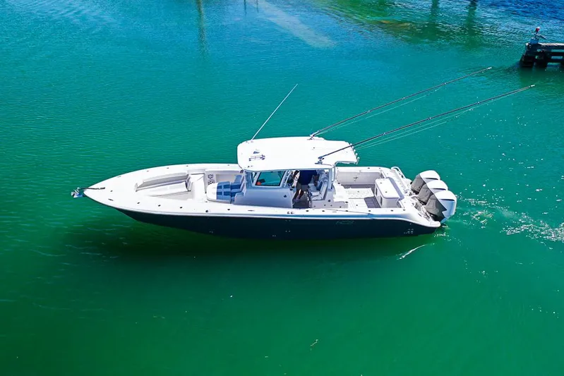  Yacht Photos Pics 2019 HCB 39 Speciale boat cruising on clear turquoise water.
