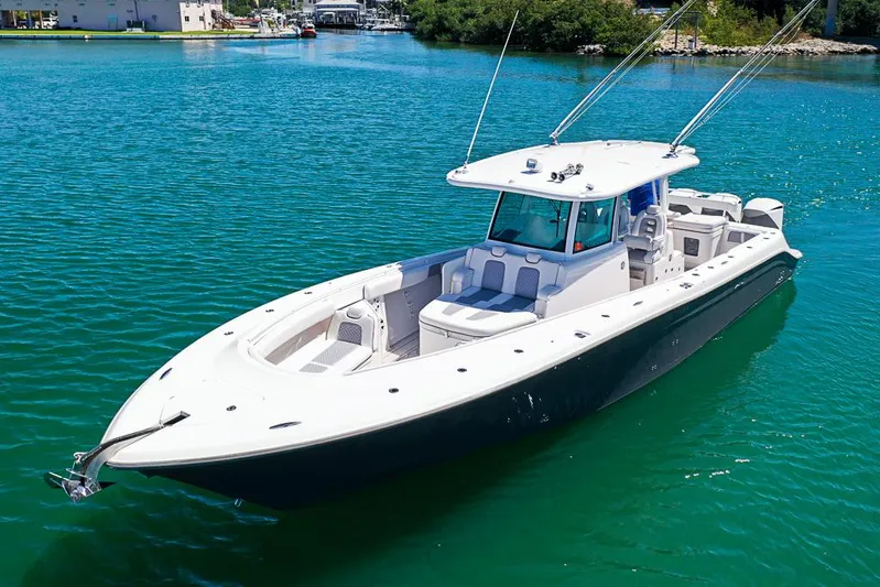 Yacht Photos Pics 2019 HCB 39 Speciale boat on clear blue water, featuring sleek design and spacious deck.