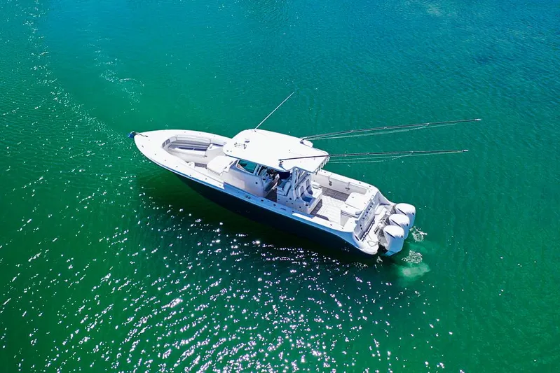  Yacht Photos Pics 2019 HCB 39 Speciale boat cruising on clear turquoise water.