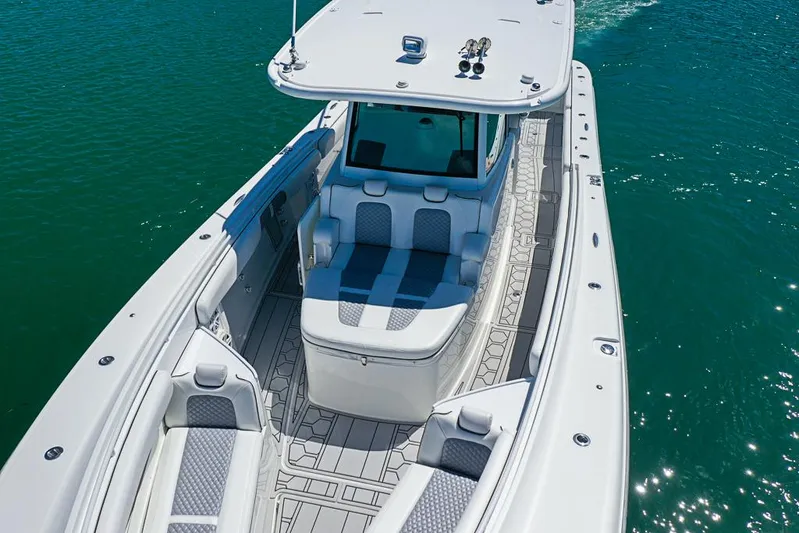  Yacht Photos Pics 2019 HCB 39 Speciale boat on water, featuring sleek design and spacious seating.