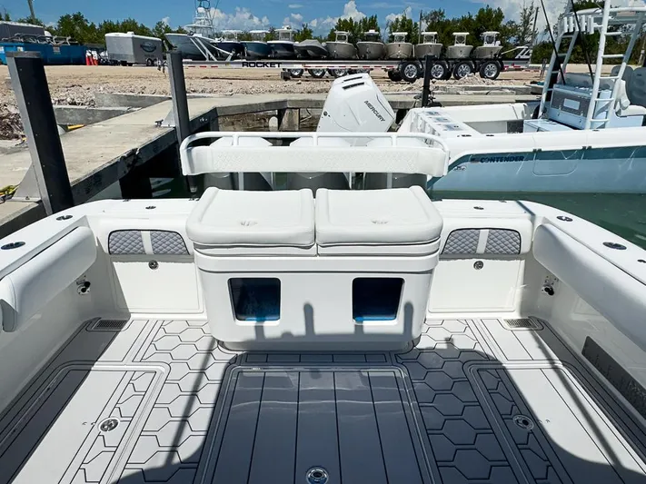  Yacht Photos Pics 2019 HCB 39 Speciale boat interior with cushioned seating and storage compartments.