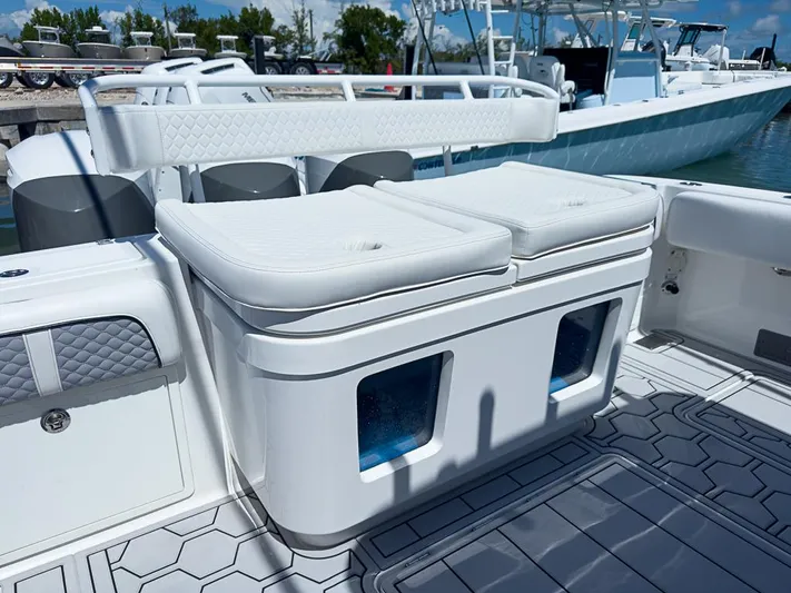  Yacht Photos Pics 2019 HCB 39 Speciale boat interior with cushioned seating and storage compartments.
