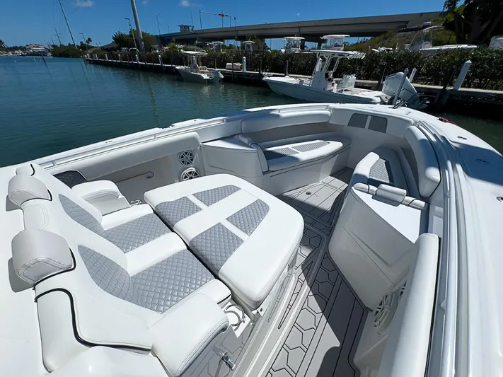  Yacht Photos Pics 2019 HCB 39 Speciale boat interior with luxurious seating and waterfront view.