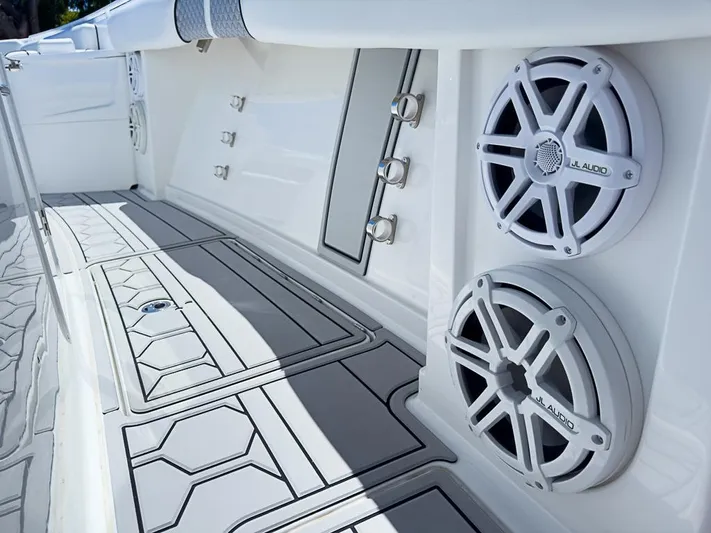  Yacht Photos Pics 2019 HCB 39 Speciale boat interior with JL Audio speakers and stylish flooring.