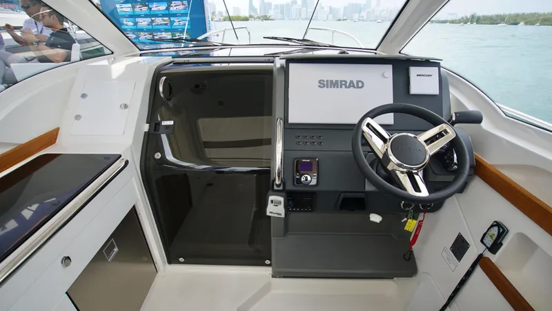 In-stock 2024 Nimbus W9 #279 Yacht Photos Pics 2024 Nimbus Weekender 9 #279 boat cockpit with Simrad navigation system.