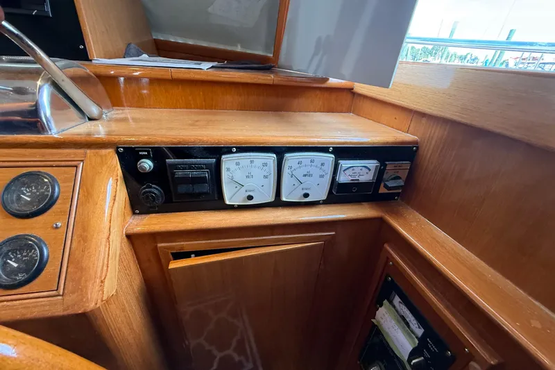Revere Yacht Photos Pics Control panel of 2002 Grand Banks 42 Classic yacht with gauges and switches.