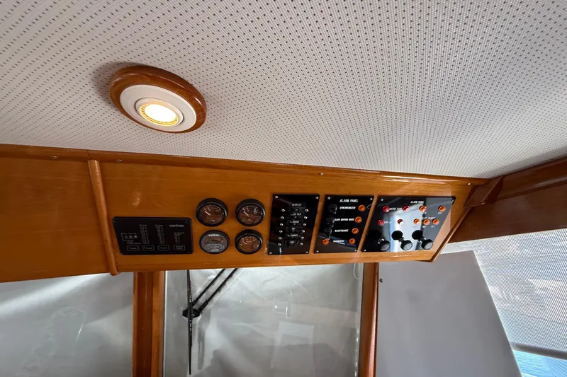 Revere Yacht Photos Pics Control panel of a 2002 Grand Banks 42 Classic yacht with gauges and switches.