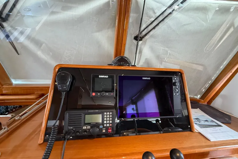 Revere Yacht Photos Pics Navigation equipment on 2002 Grand Banks 42 Classic yacht dashboard with Simrad displays.