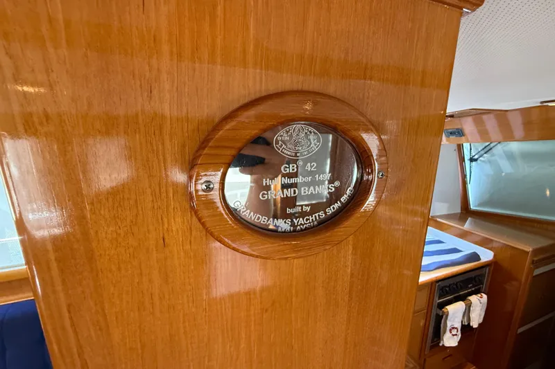 Revere Yacht Photos Pics Plaque on 2002 Grand Banks 42 Classic yacht interior, showcasing craftsmanship details.