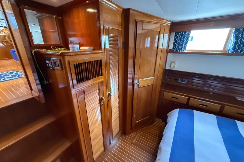 Revere Yacht Photos Pics Luxurious wooden interior of 2002 Grand Banks 42 Classic yacht cabin.