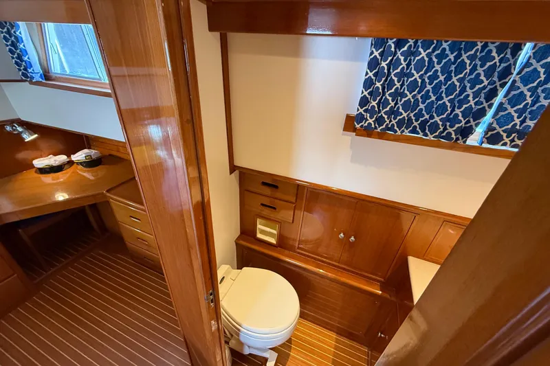 Revere Yacht Photos Pics Luxurious wooden interior of 2002 Grand Banks 42 Classic yacht bathroom.