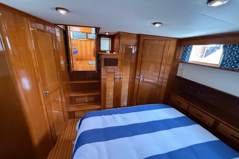Revere Yacht Photos Pics Luxurious cabin interior of 2002 Grand Banks 42 Classic yacht with wood finish.