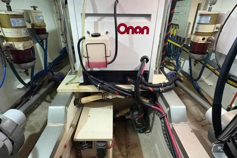 Revere Yacht Photos Pics Engine room of 2002 Grand Banks 42 Classic with Onan generator and wiring.