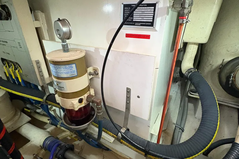 Revere Yacht Photos Pics Engine room of 2002 Grand Banks 42 Classic with fuel water separator.