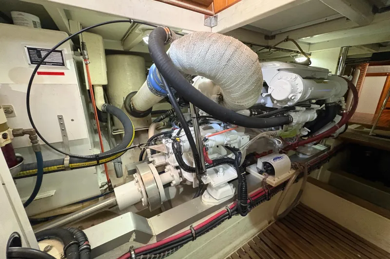 Revere Yacht Photos Pics Engine room of 2002 Grand Banks 42 Classic yacht, showcasing detailed mechanical components.