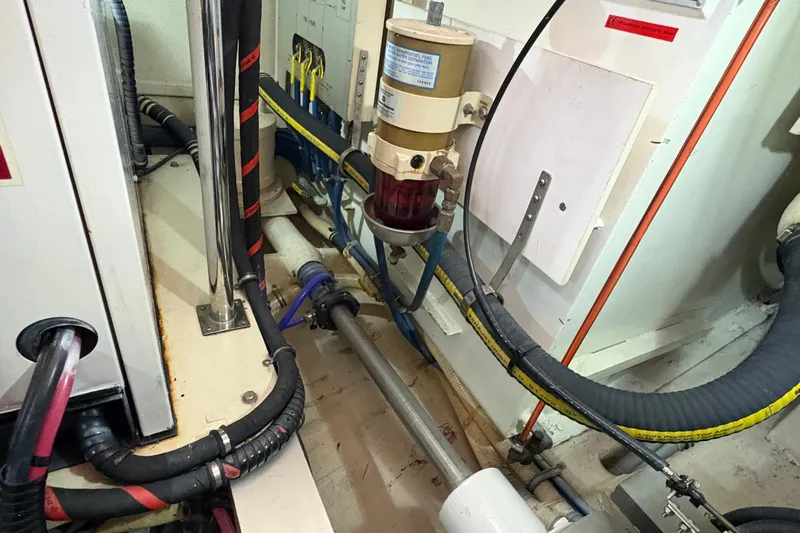 Revere Yacht Photos Pics Engine room of 2002 Grand Banks 42 Classic yacht, showcasing mechanical components and wiring.