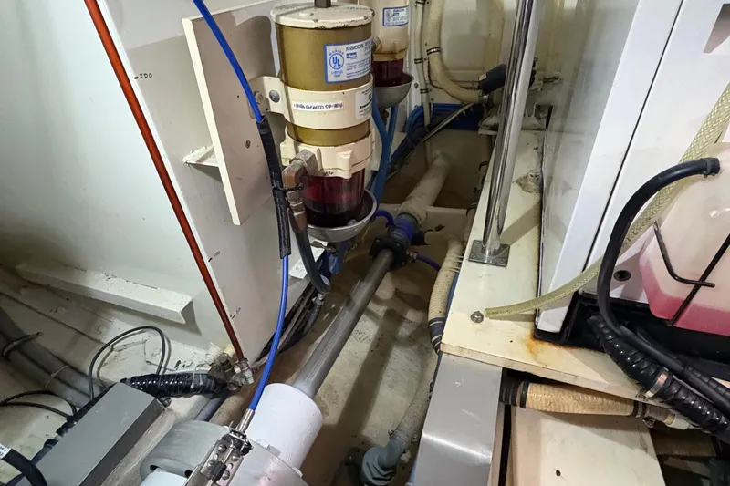 Revere Yacht Photos Pics Engine room of a 2002 Grand Banks 42 Classic yacht, showcasing mechanical components.